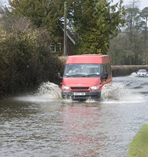 Road Prints: Van splashing through flood