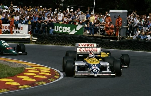 Williams FW11 Ricardo Patrese leads Nigel Mansell.1986 British Grand Prix Williams FW11 Ricardo Patrese leads Nigel Mansell.1986 British Grand Prix