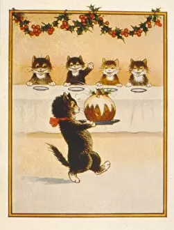 Cats waiting for their Christmas pudding